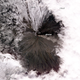 Illustration for article titled Russian volcano Klyuchevskaya continues to spew fire onto its icy slopes